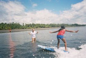 Kristin Wilson teaching orphans to surf – Best Places In The World To Retire – International Living